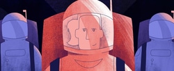 An astronaut flanked by two other astronauts.