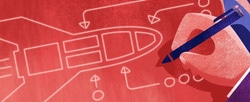 A person drawing a rocket blueprint.