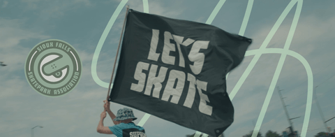 A stylized photo of a Let's Skate flag with a Let's Skate logo.