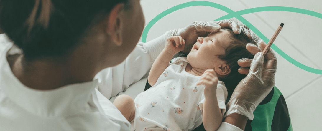 A stylized photo of a physician with a baby.
