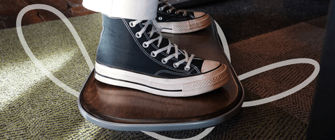 Shoes on a balance board.