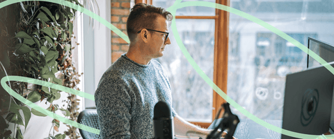 Joe Kepley sitting at his desk.