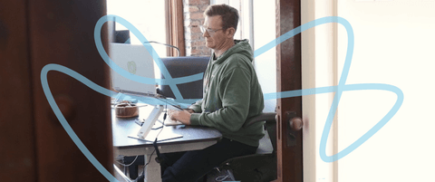 Joe Kepley sitting at his desk.