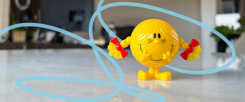 A Little Miss Sunshine figure.