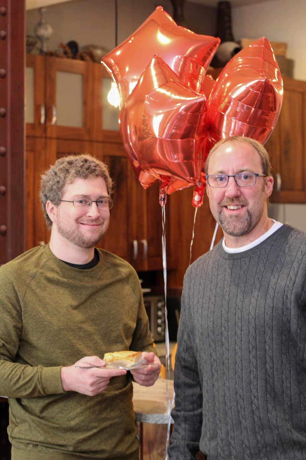 Chris and Joshua celebrate their certifications.